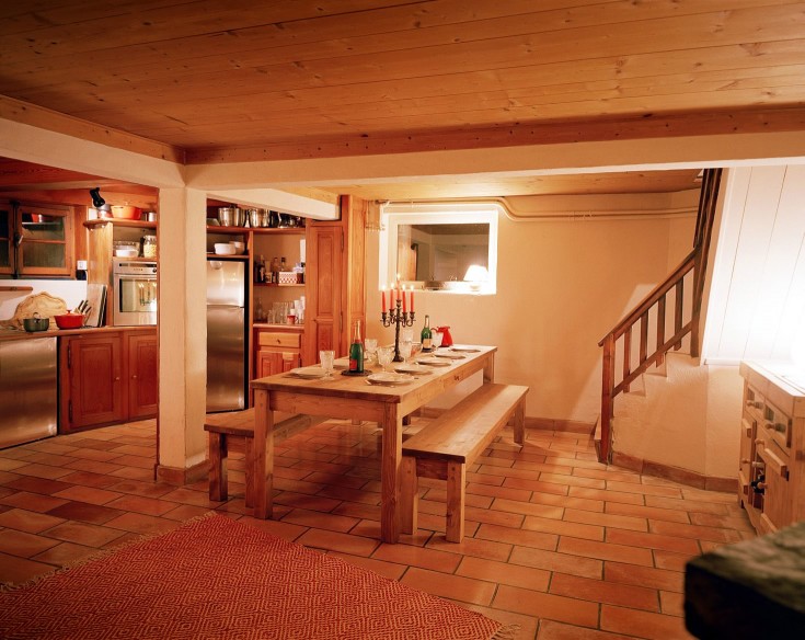 Kitchen with new appliances and chunky pine table